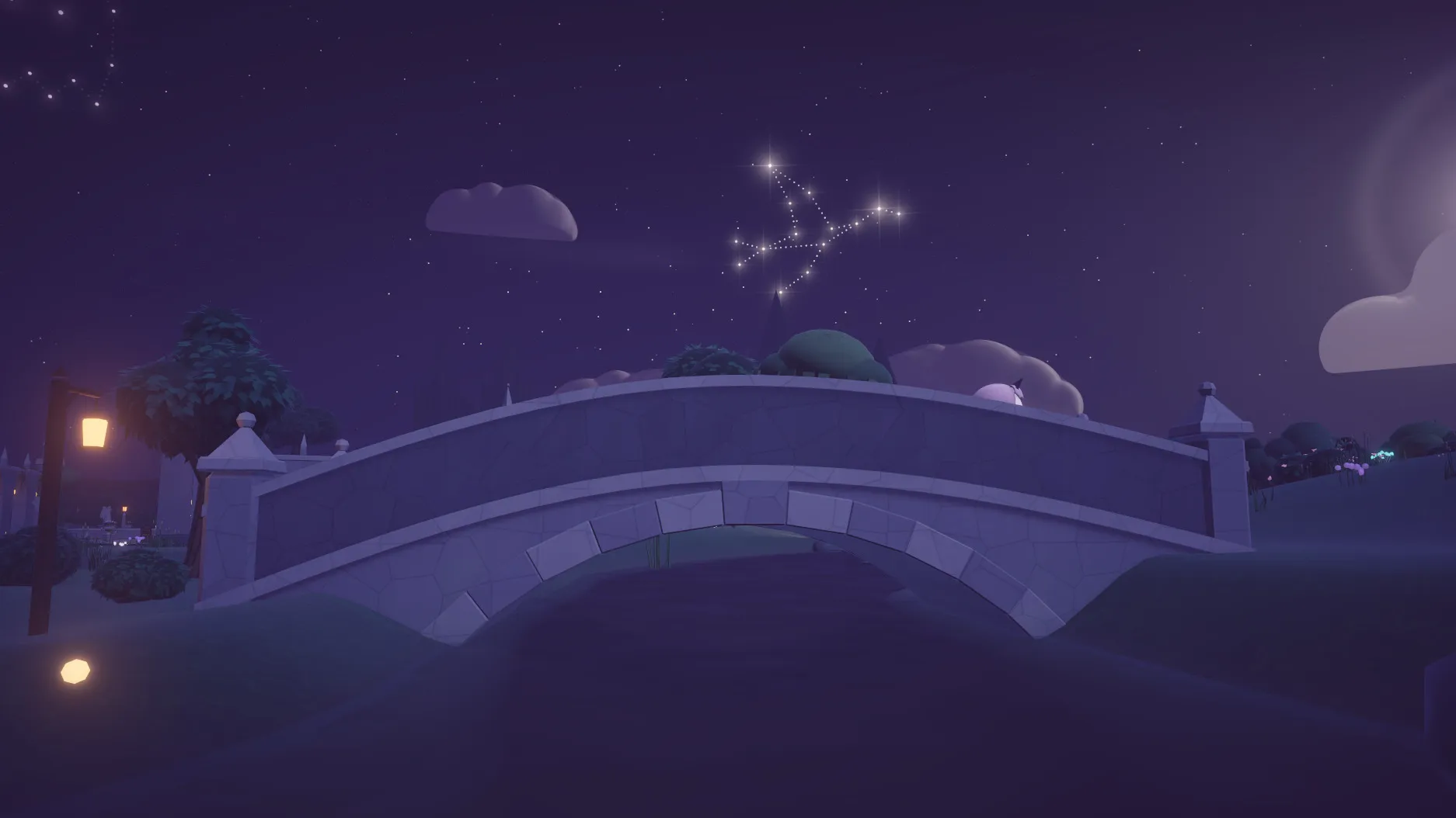 A stone footbridge over a river under a starry sky