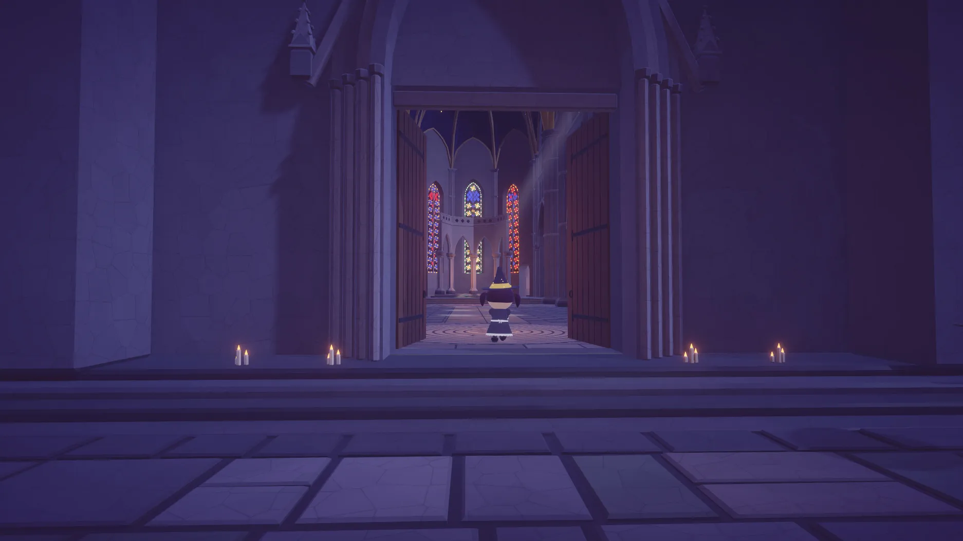 A view through open cathedral doors to stained glass at the far end