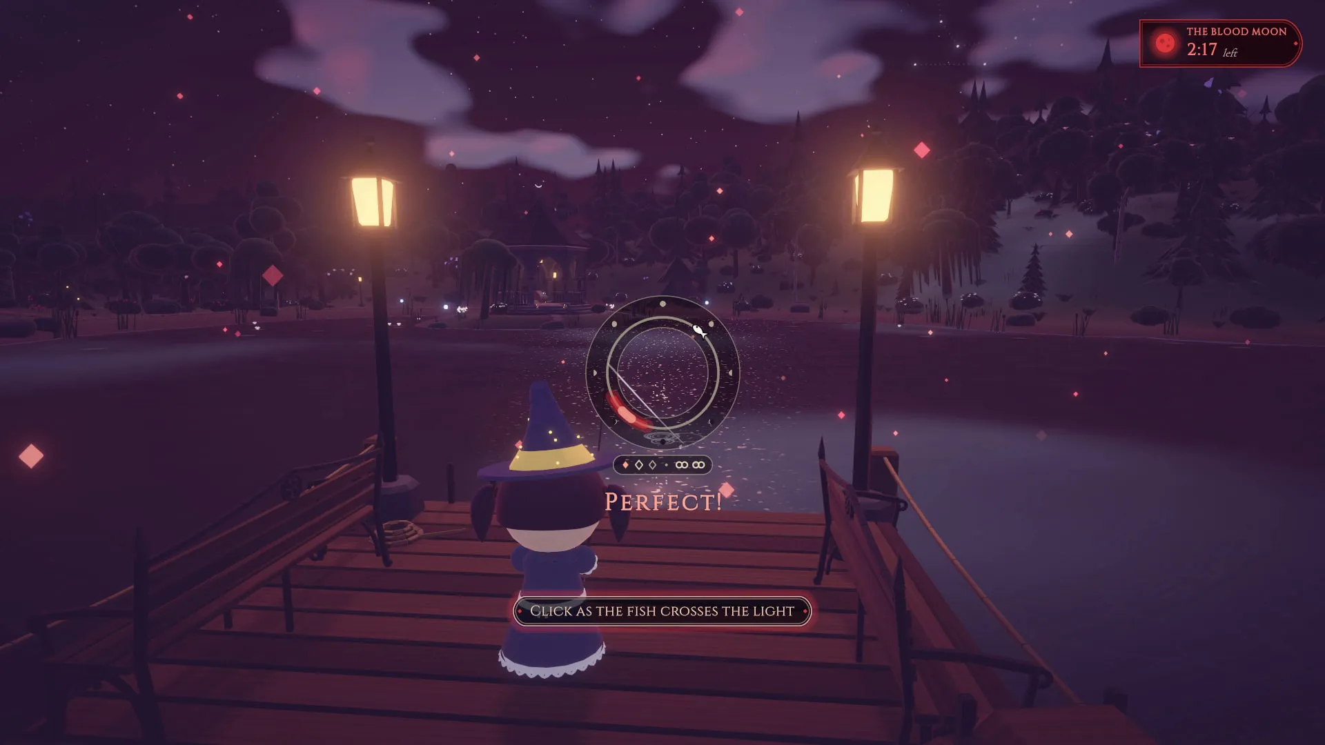 A player on a lantern-lit pier landing a fish on the Moon Ring, the word Perfect over it