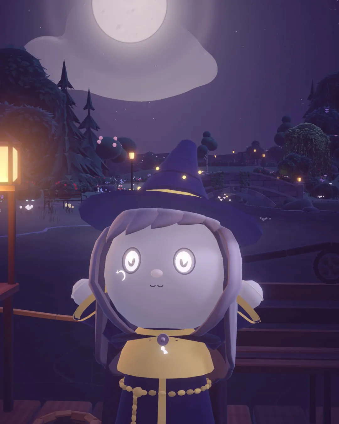 A player in a witch’s hat and a gold-trimmed robe under the moon